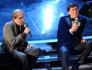 SANREMO, ITALY - FEBRUARY 18:  Gianni Morandi and Adriano Celentano performs on stage at the closing night of the 62th Sanremo Song Festival at the Ariston Theatre on February 18, 2012 in Sanremo, Italy.  (Photo by Daniele Venturelli/Getty Images)
