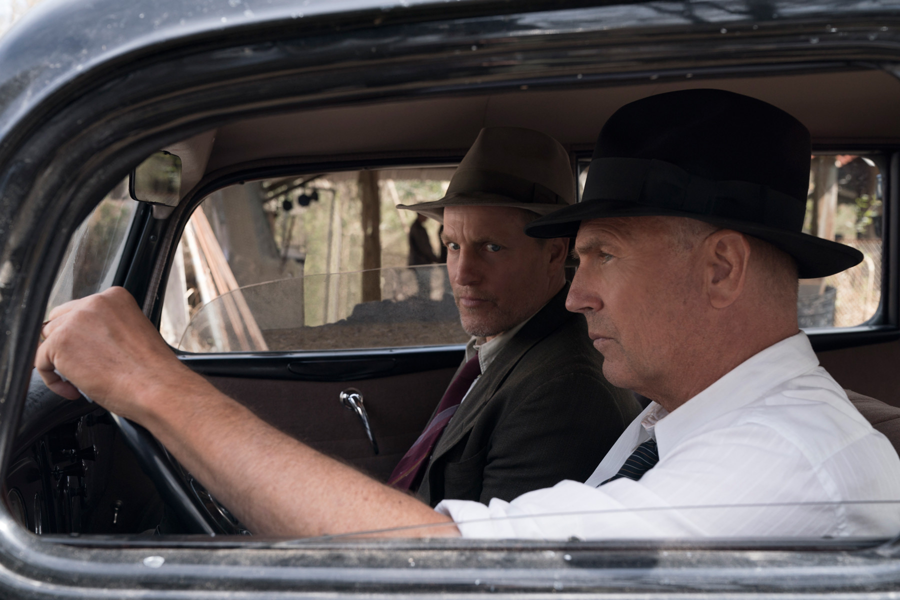 pictured L-R: Woody Harrleson ("Maney Gault") and Kevin Costner ("Frank Hamer") in THE HIGHWAYMEN